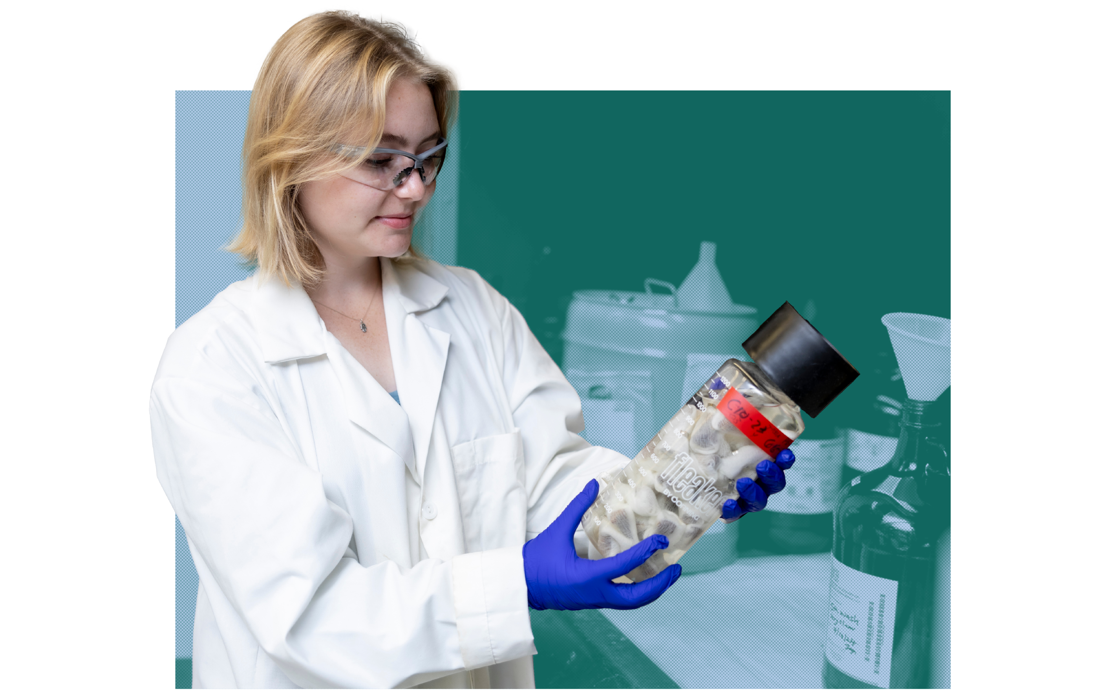 Image of Molly lobel examining a jar